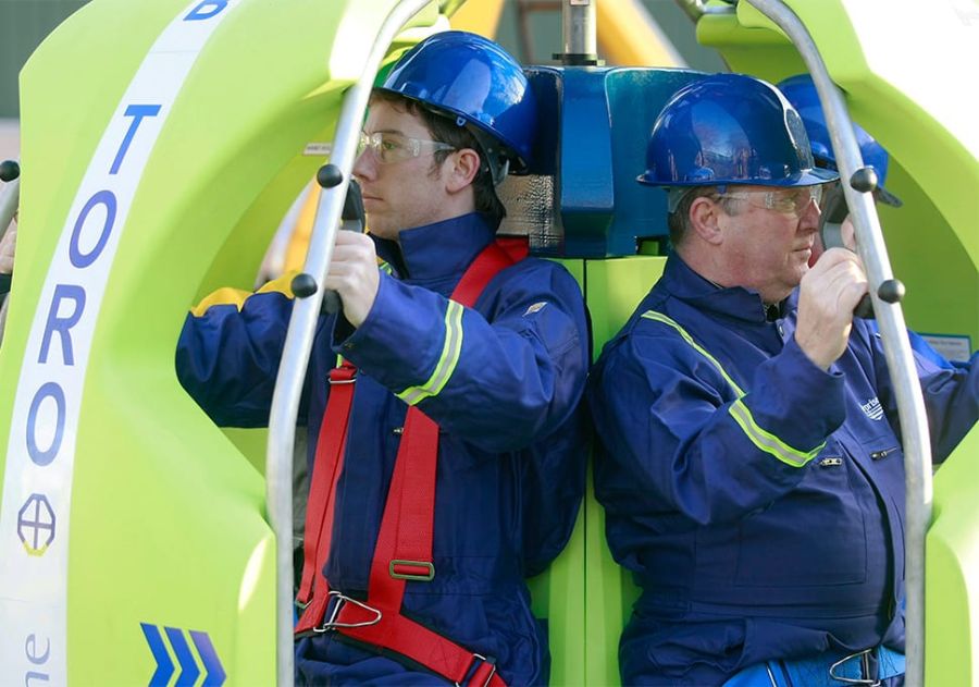 Crew in the TORO-4 transfer device from Reflex Marine.