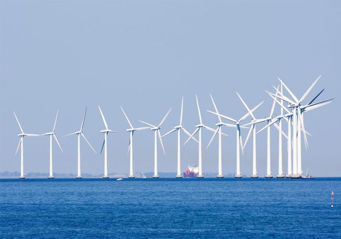 A line of wind turbines in an offshore wind farm, one of the places Reflex Marine provides safe access to.