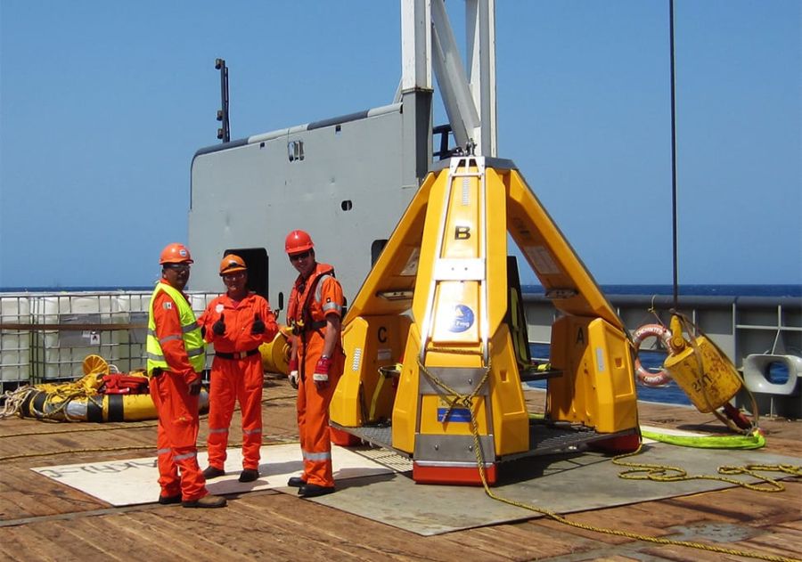 The Olympic Shipping team on deck with the Reflex Marine FROG, happy after a crane transfer.